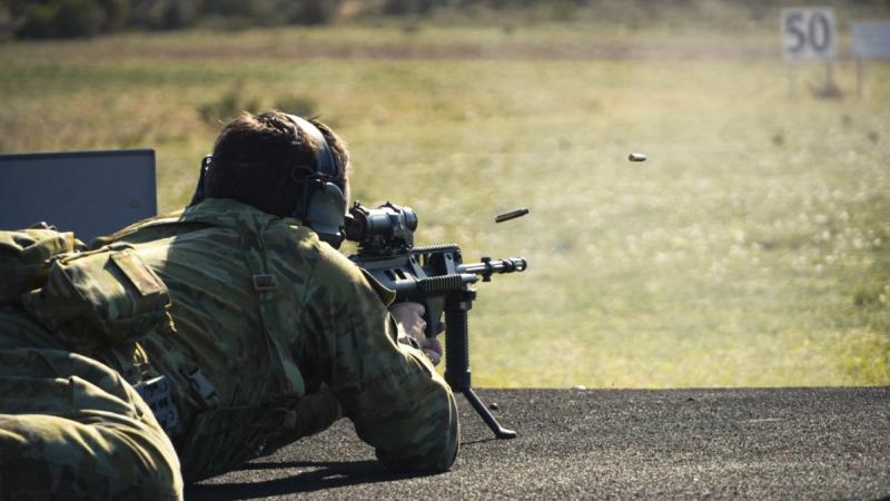 A soldier fires his weapon during the Simpson Trophy shooting competition, held at the Murray Bridge Training Area, South Australia.