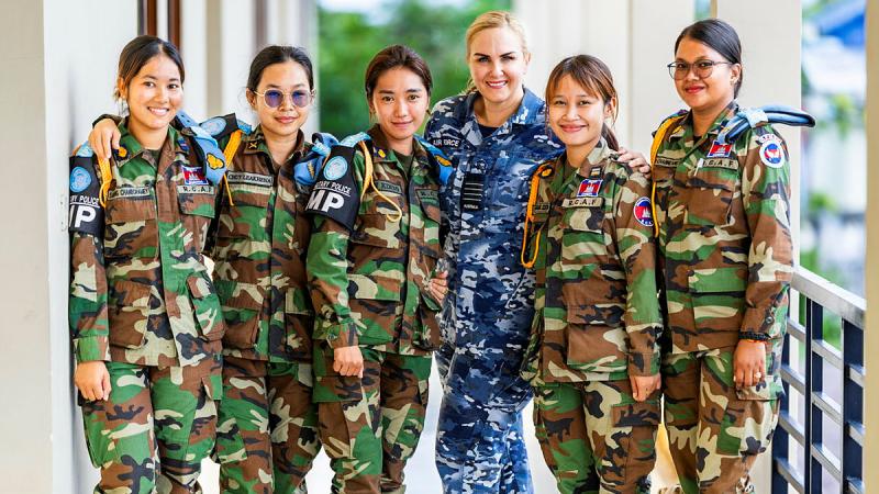 Group Captain Lesley Carney with officers from the Royal Cambodian Armed Forces during Indo-Pacific Endeavour 24. 