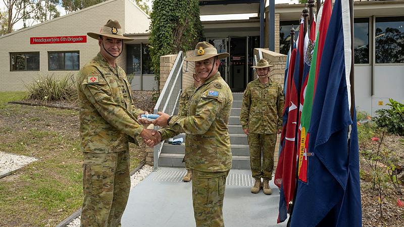 Major General Greg Novak handed command of 6th Brigade to Brigadier Deane Limmer during a change of command ceremony at Headquarters 6th Brigade, Gallipoli Barracks, on 8 December 2023. 