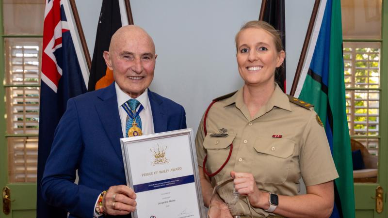 Administrator of the NT Hugh Heggie presents the 2024 Prince of Wales Award to Lieutenant Jacqueline Martin during a ceremony held at Government House, Darwin.