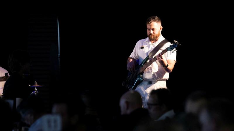Able Seaman Musician John Collins from Royal Australian Navy Band Northern Territory, performs at the International Men’s Day lunch in Darwin. 