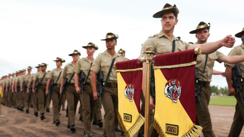 Soldiers of the newly re-linked 5th/7th Battalion, Royal Australian Regiment, march off the parade ground following the unit’s merger at Robertson Barracks. 