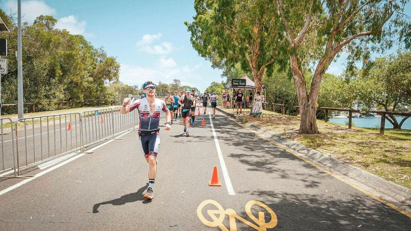  Royal Australian Navy Sub-Lieutenant Benjamin McNutt runs the last leg of the Noosa Triathlon, Noosa Heads.
