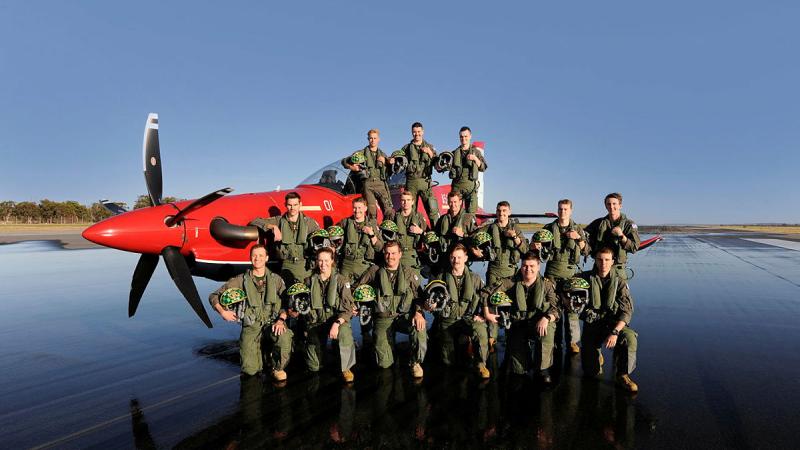 Number 277 Phase 2 ADF Intermediate Pilots’ Course members assembled on the flight line with a Pilatus PC-21 aircraft at RAAF Base Pearce in Western Australia ahead of their graduation. 