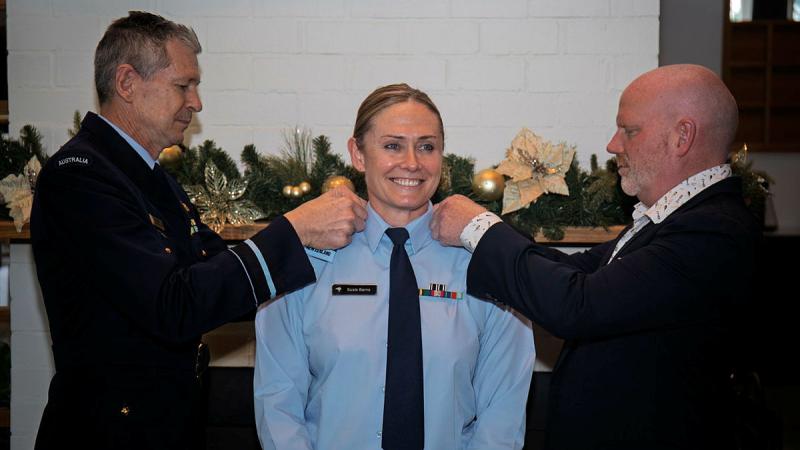Royal New Zealand Air Force Group Captain Susie Barns is promoted to Air Commodore by Air Commander Australia Air Vice-Marshal Glen Braz (left) and her spouse Tom at her promotion and appointment to Deputy Air Commander Australia ceremony, held at the ADF Academy Officer’s Mess.