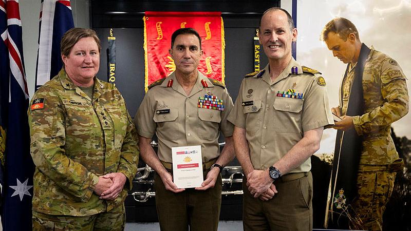 Launch of Land Pub 0.0.3 - Chaplaincy in War by the Chief of Army Lieutenant General Simon Stuart (centre) with Chaplain Sarah Gibson (left) and the Director General Chaplaincy - Army Principle Chaplain Kerry Larwill at Russell offices in Canberra.