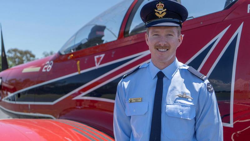 Royal Australian Air Force Pilot graduate, Pilot Officer Harrison Bell with the Pilatus PC-21 aircraft at 278 ADF Intermediate Pilots Course Graduation at 1 Flying Training School, RAAF Base East Sale. 