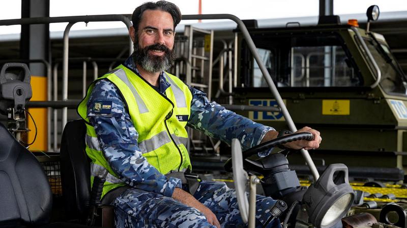 Aviation Logistics Specialist Sergeant David Hulse, from 23 Squadron Air Movements section, on a tow motor at RAAF Base Amberley, Queensland. 