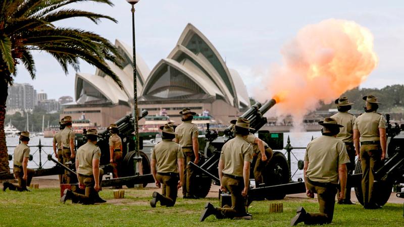 Australian Army Gunners from the 9th Regiment, Royal Australian Artillery fire a 21 Gun Salute under the Sydney Harbour Bridge. 