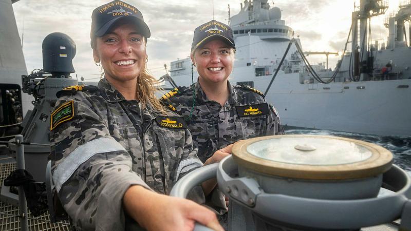 Navigating Officer, Lieutenant Tori Costello, and Commanding Officer, Commander Alisha Withers, guide HMAS Hobart as it conducts a replenishment at sea during Exercise La Perouse. 