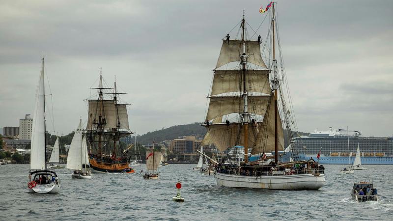 Tall ships sail through the River Derwent to mark the opening of the Royal Hobart Regatta 2025.