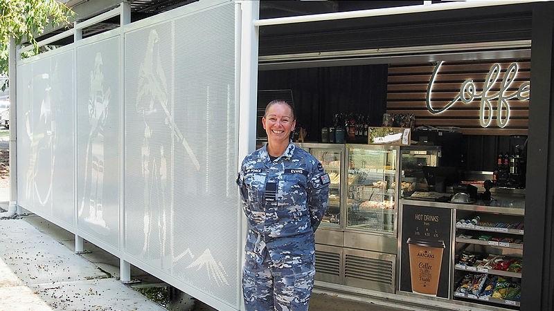 RAAF Base Amberley Senior ADF Officer Wing Commander Tanya Evans stands in front of the newly refurbished AAFCANS AP2 Kiosk. 