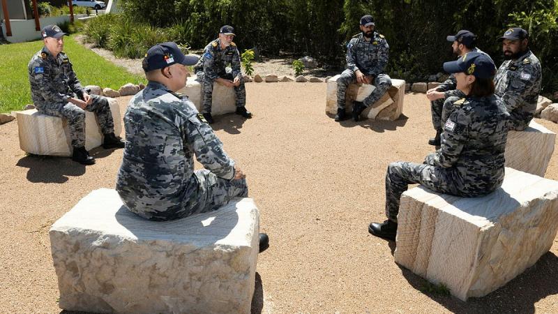 Staff and students of the Royal Australian Navy Regional Indigenous Development Coordinator course conduct a Yarning Circle together at HMAS Albatross, NSW.