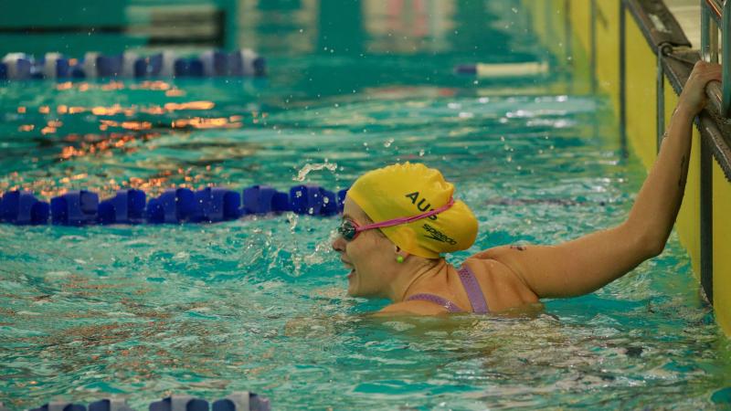 Chelsie Clayton yells her support to competitors still swimming at UBC Aquatic Centre as part of Invictus Games Vancouver Canada 2025. Photo credit - Flight Sergeant Chris Dickson. 