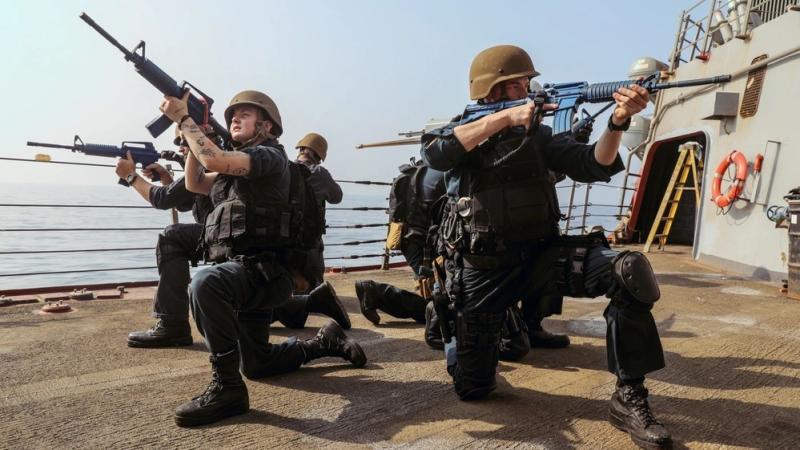 US Navy sailors participate in a visit, board, search, and seizure drill aboard the Arleigh Burke-class guided-missile destroyer USS Stout in the US Central Command area of responsibility.