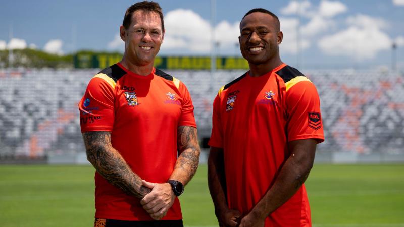Warrant Officer Class 2 Michael Allison, one of the ADF coaches at the Junior Kumuls development camp next to participant Joseph Kora. Photo by CPO Paul Berry. 