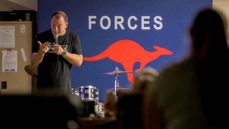 Stand-up comedian Anthony 'Lehmo' Lehmann performs at Camp Baird Headquarters in the Middle East for deployed ADF personnel during the Forces Entertainment Tour. 