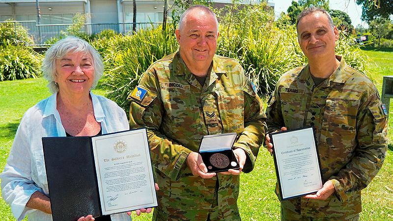 Australian Army Corporal Paul Incoll (Middle) is awarded the Soldier’s Medallion for exemplary service by the Commander of South Queensland Australian Army Cadets Brigade, Colonel Athanasios Tsamis at Brisbane, Queensland.