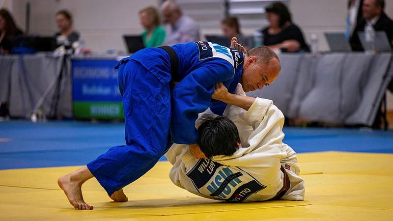 Australian Army soldier Private Charles Laidlaw, left, pins his opponent to win his match at the Canberra International Open judo tournament in Goulburn. 