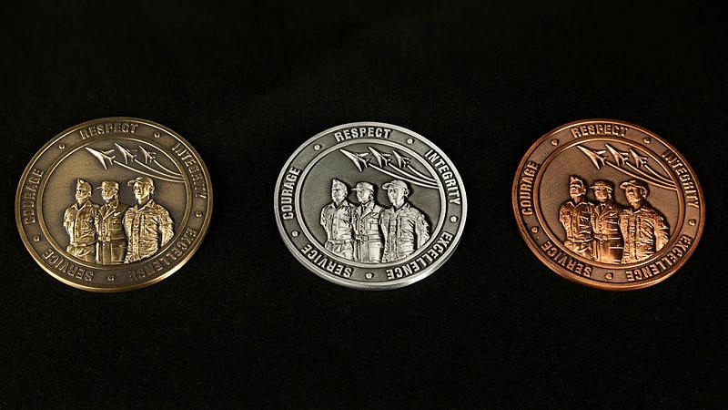 Above: Air Force Service Medallions, L to R, recognising 20 years, 10 years and four years of service. 