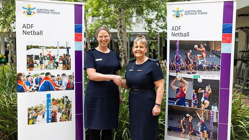 Australian Defence Force Netball president, Wing Commander Jacqueline Carswell, welcomes Air Vice Marshall Wendy Blyth as the new sport patron at Russell Offices in Canberra.