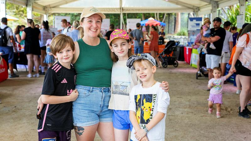 Leading Seaman Codi Kerr with her children at the Defence Family and Members Support welcome event, held at Luna Park, Sydney. 