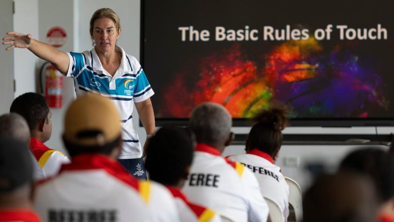 Royal Australian Air Force Leading Aircraftwoman Amanda Crowley instructs a Federation of International Touch Football referee course during the ADF sports training program in Papua New Guinea.