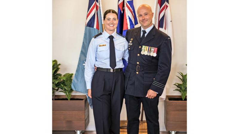 Wing Commander Brook Porter with his daughter Alex at her graduation from Officers’ Training School, RAAF Base East Sale, Victoria.