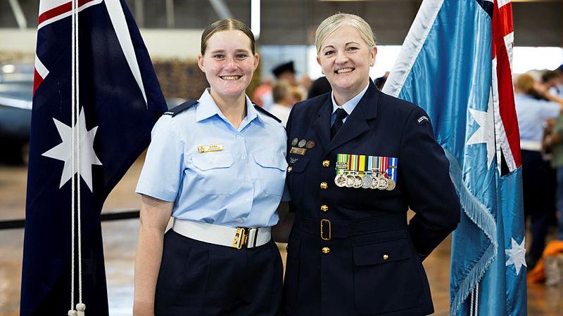 Aircraftwoman Kiera Proctor stands with Commanding Officer of 1 Recruit Training Unit Wing commander Jodie Mason after her graduation ceremony. 