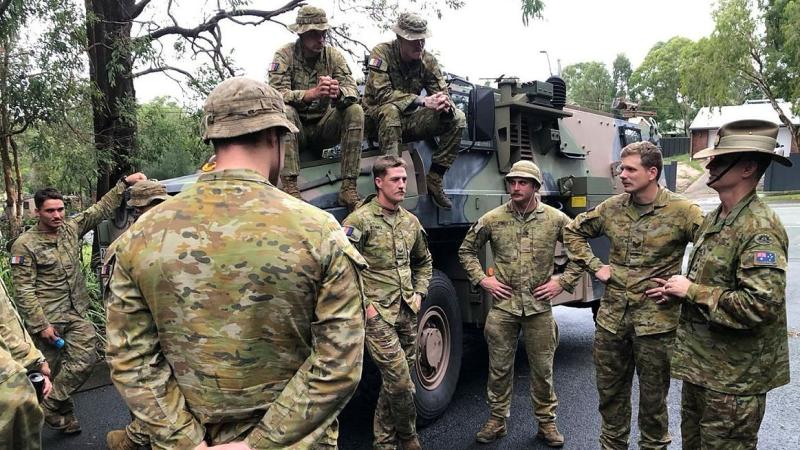 Members of 6 Battalion, Royal Australian Regiment meet Commander 11 Brigade, Brigadier Richard Peace, at Redlands City Council Local Government Area while supporting the local community affected by Ex Tropical Cyclone Alfred. 