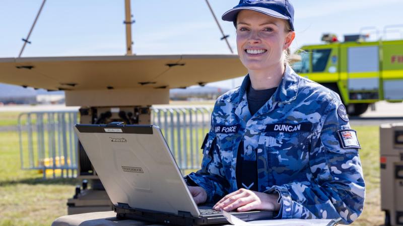 Leading Aircraftwoman Leah Duncan, a network technician from No. 1 Combat Communications Squadron, monitors radar equipment at the Australian International Airshow 2025.
