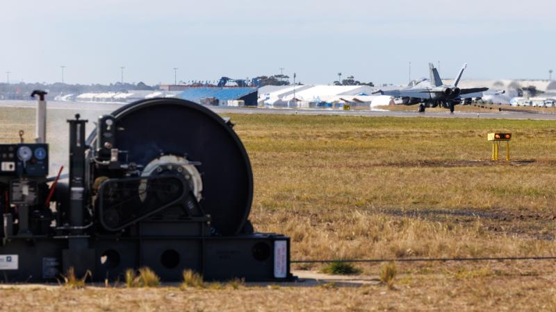 A No.6 Squadron EA-18G Growler conducts a proof of arrest using the tactical aircraft arrestor system during the Australian International Air Show 2025, at Avalon Airport.