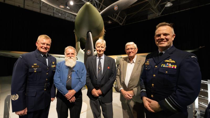 (L-R) Royal Australian Air Force, Warrant Office of the Air Force Ralph Clifton, Mr Gary Walsh, Mr Rodney Ticler, Mr David Gardner, and Chief of Air Force, Air Marshal Stephen Chappell, DSC, CSC, OAM, at the unveiling of a recently restored P-40E Kittyhawk at RAAF Base Point Cook. 