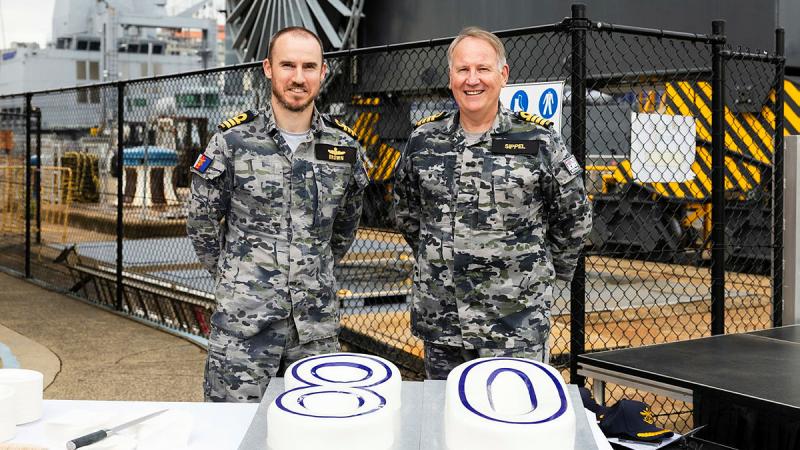 Principal Commonwealth Representative Commander Ben Brown (left) and Director Regional Maintenance Centre - East Captain David Sippel attend the 80th Anniversary of the Captain Cook Graving Dock held at Garden Island, NSW. Photo: Able Seaman Danyellah Hill