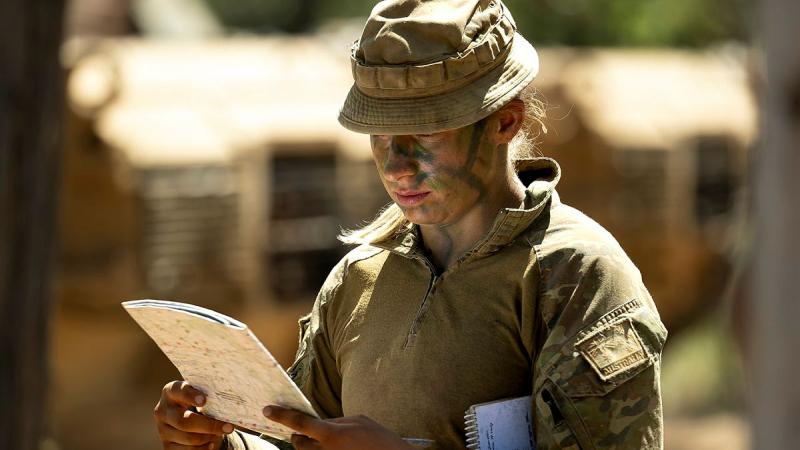 Then Lieutenant Zoe Monck gives orders to her troops during Exercise Eagle Walk at Townsville Field Training Area. 