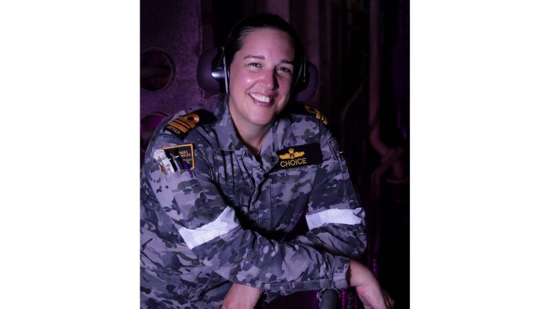 Engineering Officer HMAS Choules, Lieutenant Commander Rayne Choice, in the engine room on board the ship during a flight certification period. 