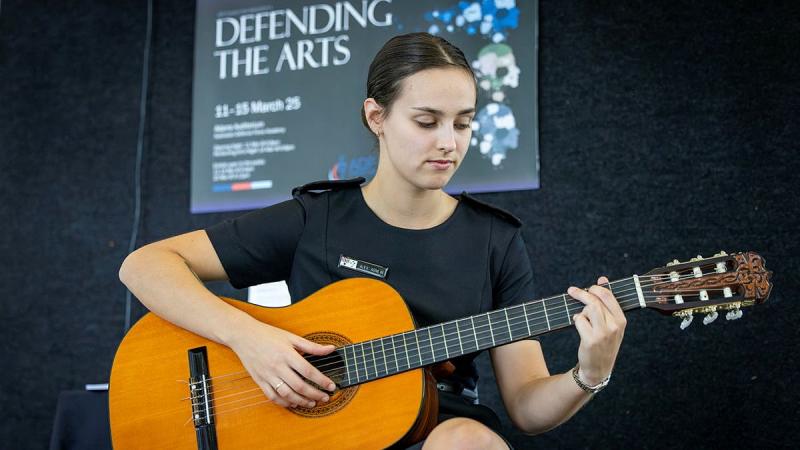Royal Australian Navy Midshipman Alex Agnew at the Defending the Arts Festival exhibition in Canberra.