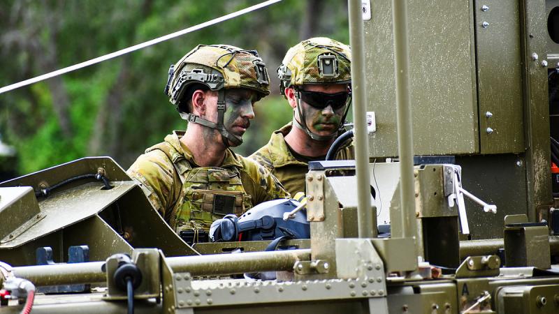 Gunner Jake McKean and Gunner Fergus Eastaugh, assess the trailer-mounted UAV recovery system during Exercise Chimera Walk at the Shoalwater Bay Training Area, Queensland. 