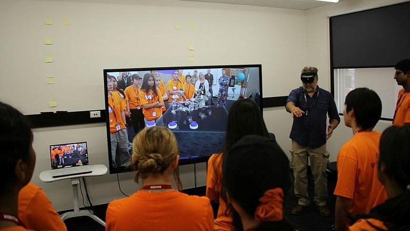 Students at STEM to the Rescue work experience program using augmented reality.