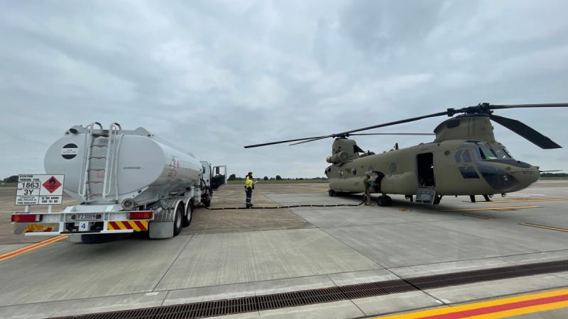 Army Corporal Bailey Cassidy refuels a CH-47F Chinook with some 3000lbs of blended sustainable aviation fuel at RAAF Base East Sale in southern Victoria. 