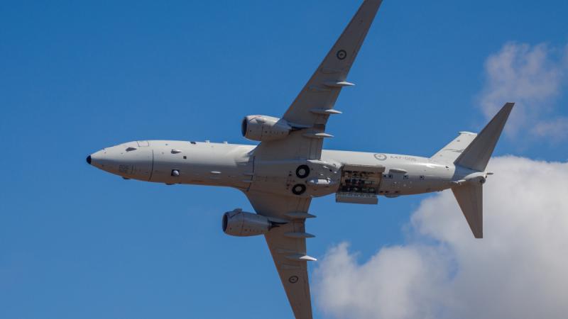 A P-8A Poseidon opens its bomb bay doors as a part of a capability showcase during the Australian International Airshow 2025, at Avalon Airport.