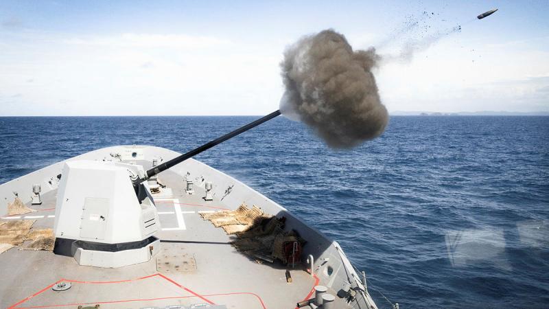 HMAS Sydney conducts a 5-inch gun firing during regional presence deployment. 