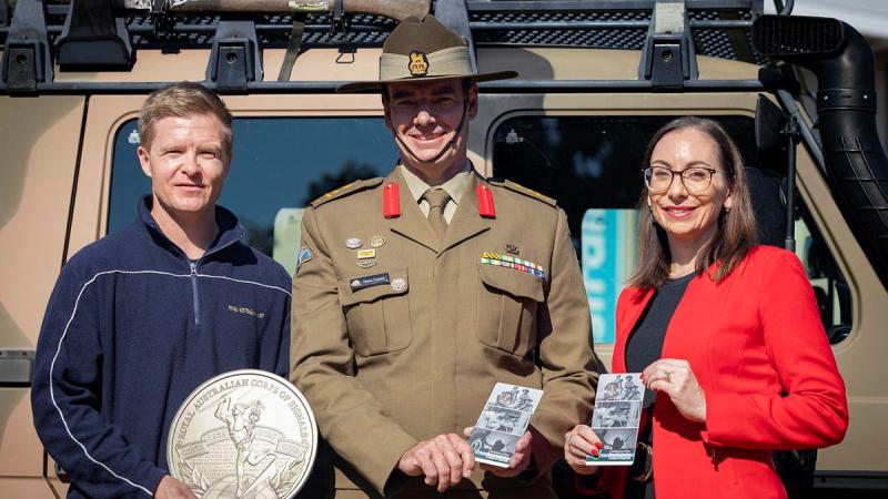 From left, Royal Australian Mint coin designer Adam Ball, Army Head of Corps Brigadier Deane Limmer and acting Chief Executive Officer Emily Martin of the Royal Australian Mint, at the Royal Australian Mint in Canberra.