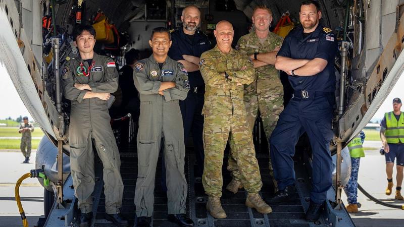 Republic of Singapore Air Force Major Lester Lim, Royal Malaysian Air Force Major Izhar Tarmizi, United Kingdom Royal Navy Commander Mike Cripps, Australian Army Major Mark Tamblyn, Royal New Zealand Air Force Squadron Leader Chris Mitchell, United Kingdom Royal Navy Lieutenant Commander Karl Byrn.