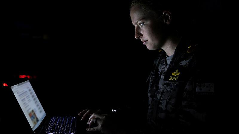  Navy Lieutenant Jacqui Heeney, from Fleet Cyber Unit, works in the cyber cell at Headquarters Integrated Area Defence System during Exercise Bersama Shield at Royal Malaysian Air Force Base Butterworth. 