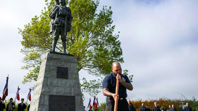 Able Seaman Todd McGrady of Australia’s Federation Guard rehearses with his didgeridoo at Bullecourt Digger Memorial park in France prior to Anzac Day commemorative services. 