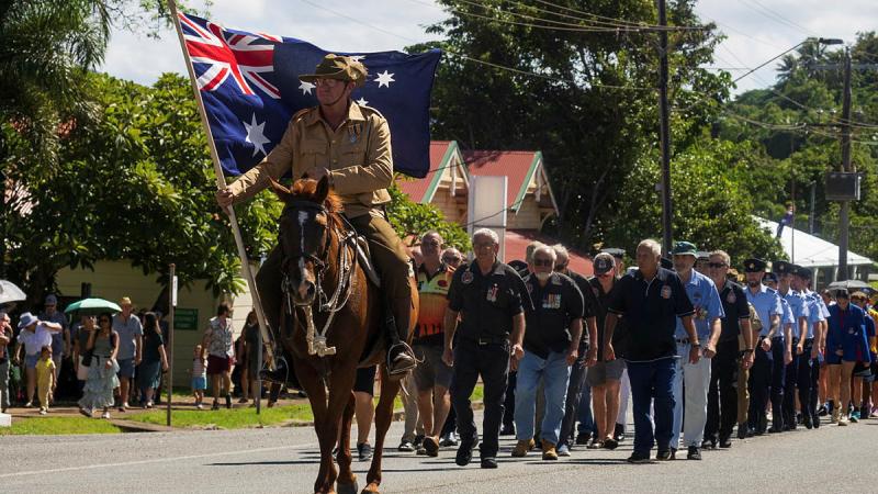 ADF personnel, veterans and high school students march during Anzac Day commemorations, Cooktown, Queensland. 
