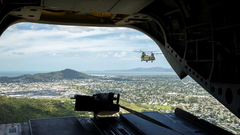 Two CH47-F Chinooks from the 5th Aviation Regiment conduct a mission during the Defence Force Remuneration Tribunal visit to Townsville, Queensland.