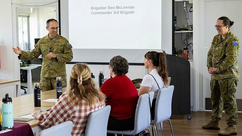 Commander 3rd Brigade Brigadier Ben McLennan CSC and Bar, speaks with Defence family members at Gecko's Family Centre, Townsville.