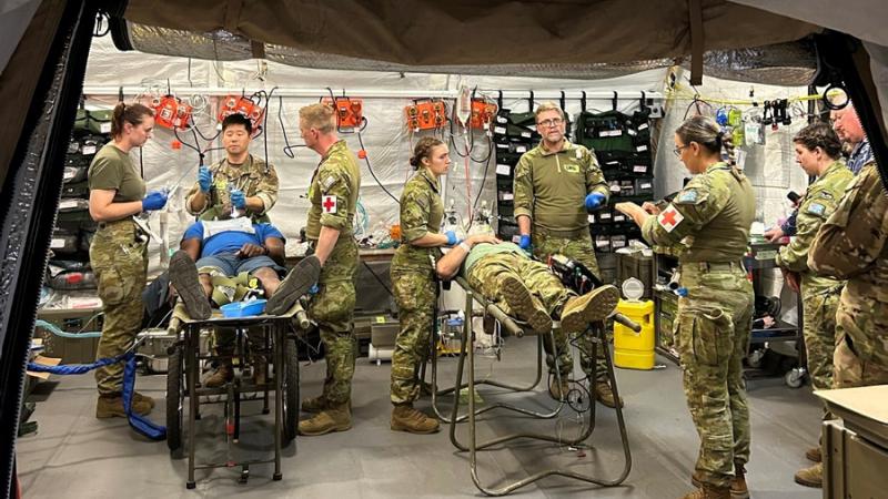 Air Force health personnel work with coalition partners within the R2 Bravo emergency department.